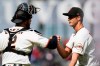 San Francisco Giants catcher Curt Casali, left, celebrates with pitcher Tyler Rogers after the Giants defeated the Miami Marlins in a baseball game in San Francisco, Sunday, April 25, 2021. (AP Photo/Jeff Chiu)