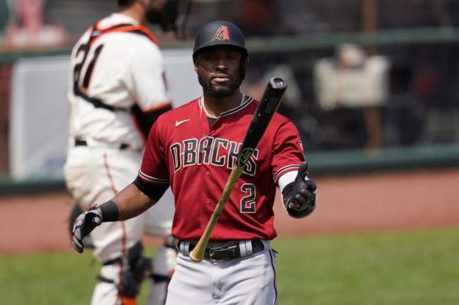 Arizona Diamondbacks' Starling Marte flips his bat after striking out against the San Francisco Giants during the fourth inning of a baseball game in San Francisco, Sunday, Aug. 23, 2020. (AP Photo/Jeff Chiu)