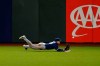 Texas Rangers' Nick Solak cannot catch San Francisco Giants' Darin Ruf's two-run double during the seventh inning of a baseball game in San Francisco, Friday, July 31, 2020. (AP Photo/Jeff Chiu)