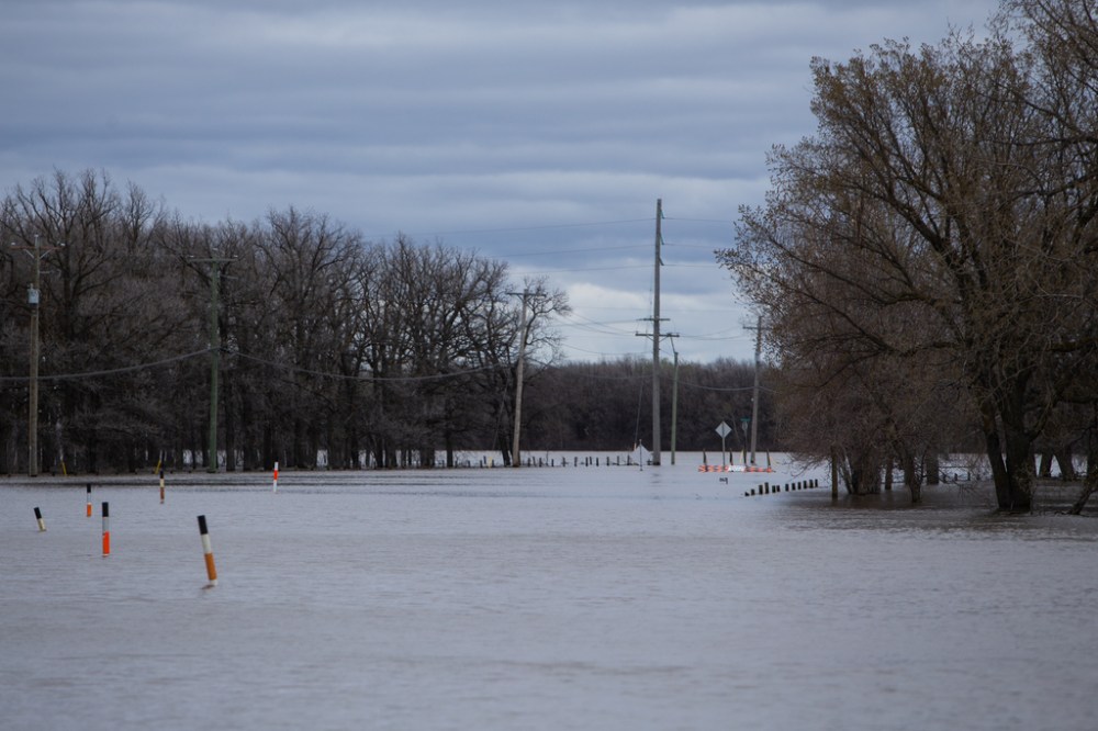 Provincial Road 200 south of Winnipeg toward was completely submerged on Saturday. (Daniel Crump / Winnipeg Free Press)