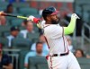 Atlanta Braves outfielder Marcell Ozuna hits a two-run home run against the Chicago Cubs during the first inning of a baseball game, Wednesday, April 28, 2021 in Atlanta. (Curtis Compton/Atlanta Journal-Constitution via AP)