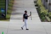 Atlanta Braves Hall of Famer Chipper Jones leaves the batting cages twirling his bat after a morning session of batting practice during baseball spring training, Wednesday, Feb. 24, 2021, in North Port, Fla. (Curtis Compton/Atlanta Journal-Constitution via AP)