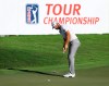 Dustin Johnson misses an eagle putt on the 18th green during the second round of the Tour Championship golf tournament at East Lake Golf Club, Saturday, Sept. 5, 2020 in Atlanta. Johnson made birdie on the hole. (Curtis Compton/Atlanta Journal-Constitution via AP)