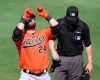 Baltimore Orioles' DJ Stewart reacts after hitting a solo home run against the Atlanta Braves during the fourth inning of a spring baseball game at CoolToday Park in North Port, Fla., Wednesday, March 3, 2021. (Curtis Compton/Atlanta Journal-Constitution via AP)