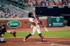 Atlanta Braves' Ronald Acuna Jr. hits an RBI double during the sixth inning of the team's baseball game against the Miami Marlins on Wednesday, Sept. 9, 2020, in Atlanta. (AP Photo/Brynn Anderson)