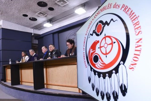 Indigenous leaders from across Canada say they are worried supports promised by the federal government to help First Nations, Inuit and Metis deal with the fallout of COVID-19 might not do enough to prevent the most vulnerable people from falling through the cracks. Assembly of First Nations (AFN) National Chief Perry Bellegarde, second from right, is joined by First Nations leaders during a press conference at the National Press Theatre in Ottawa, Tuesday, Feb. 18, 2020. THE CANADIAN PRESS/Sean Kilpatrick