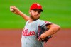 Philadelphia Phillies' Zack Wheeler pitches against the Atlanta Braves during the first inning of a baseball game Saturday, Aug. 22, 2020, in Atlanta. (AP Photo/John Amis)