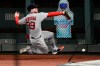 Boston Red Sox right fielder Alex Verdugo cannot catch a fly ball off the bat of Atlanta Braves' Adeiny Hechavarria during the eighth inning of a baseball game Friday, Sept. 25, 2020, in Atlanta. (AP Photo/John Amis)