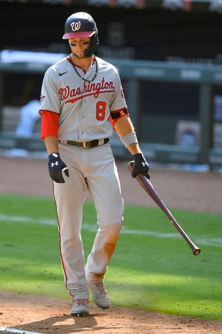 Washington Nationals' Carter Kieboom walks away after popping out to end a baseball game against the Atlanta Braves, Sunday, Sept. 6, 2020, in Atlanta. (AP Photo/John Amis)