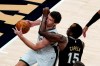 Milwaukee Bucks center Brook Lopez drives against Atlanta Hawks center Clint Capela (15) during the first half of an NBA basketball game Thursday, April 15, 2021, in Atlanta. (AP Photo/John Bazemore)