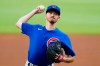 Chicago Cubs starting pitcher Zach Davies works against the Atlanta Braves in the first inning of a baseball game Monday, April 26, 2021, in Atlanta. (AP Photo/John Bazemore)