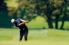 Dustin Johnson hits from the fairway on the fourth hole during the final round of the Tour Championship golf tournament at East Lake Golf Club in Atlanta, Monday, Sept. 7, 2020. (AP Photo/John Bazemore)