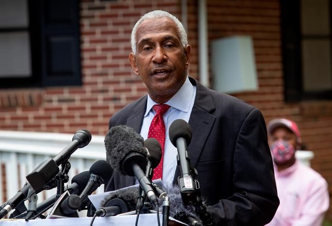 Richard Rose, president of the Atlanta branch of the NAACP, is seen at a news conference about the death of Ahmaud Arbery on Tuesday, May 19, 2020, in East Point, Georgia. After a video of the shooting of Arbery emerged on social media, the Georgia Bureau of Investigation arrested Gregory McMichael, 64, and his son, Travis McMichael, 34, and they were jailed on murder and aggravated assault charges. (AP Photo/Ron Harris)