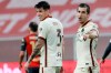 Roma's Henrikh Mkhitaryan, right, celebrates after scoring during the Serie A soccer match between Genoa and Roma, at the Luigi Ferraris Stadium in Genoa, Italy, Sunday, Nov. 8, 2020. (Tano Pecorao/LaPresse via AP)