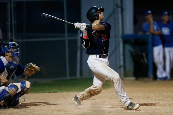 JOHN WOODS / WINNIPEG FREE PRESSElmwood Giants Zach Delaquis looks up at his hit that brought in the winning run against the Altona Bisons in Winnipeg Monday.