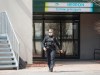 A police officer is shown at Maison Herron, a long term care home in the Montreal suburb of Dorval, Sunday, April 12, 2020, as COVID-19 cases rise in Canada and around the world. THE CANADIAN PRESS/Graham Hughes