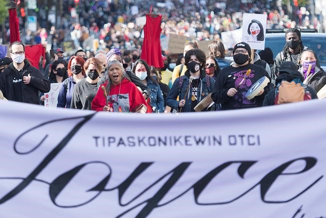 People take part in a protest called ‘Justice for Joyce’ in Montreal, Saturday, October 3, 2020, where they demanded Justice for Joyce Echaquan and an end to all systemic racism. THE CANADIAN PRESS/Graham Hughes