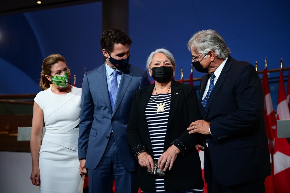 CP
Sophie Gregoire Trudeau (from left), Prime Minister Justin Trudeau, Mary Simon and her husband Whit Fraser speak together after it was announced that Simon would become Canada's new Governor General. (Sean Kilpatrick / The Canadian Press)