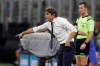 Inter Milan's head coach Antonio Conte gives instructions from the side line during a Serie A soccer match between Inter Milan and Fiorentina, at the San Siro stadium in Milan, Italy, Wednesday, July 22, 2020. (AP Photo/Luca Bruno)