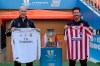 Atletico Madrid's head coach Diego Simone, right, stands with Real Madrid's head coach Zinedine Zidane during the trophy photo call at King Abdullah stadium, in Jiddah, Saudi Arabia, Saturday, Jan. 11, 2020, ahead of their Spanish Super Cup Final soccer match between Real Madrid and Atletico Madrid on Sunday. (AP Photo/Hassan Ammar)