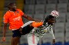 Basaksehir's Demba Ba, left, fights for the ball with Manchester United's Axel Tuanzebe during the Champions League group H soccer match between Istanbul Basaksehir and Manchester United at the Fatih Terim stadium in Istanbul, Wednesday, Nov. 4, 2020. (AP Photo)