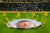 A giant canvas showing late Argentinian player Emiliano Sala is pictured in La Beaujoire stadium prior the French League One soccer match between Nantes against Bordeaux in Nantes, western France, Sunday, Jan. 26, 2020. Nantes paid an emotional tribute to Emiliano Sala by wearing a special blue and white (AP Photo/Michel Euler)