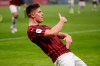 AC Milan's Krzysztof Piatek celebrates after scoring his side's opening goal during an Italian Cup soccer match between AC Milan and Spal at the San Siro stadium, in Milan, Italy, Wednesday, Jan. 15, 2020. (AP Photo/Antonio Calanni)