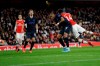 Arsenal's Pierre-Emerick Aubameyang, right, heads the ball to scores his side's third goal during the English Premier League soccer match between Arsenal and Everton at Emirates stadium in London, Sunday, Feb. 23, 2020. (AP Photo/Kirsty Wigglesworth)