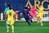 Atletico Madrid's Joao Felix, center, scores his side's second goal during the Spanish La Liga soccer match between Villarreal and Atletico Madrid at the Ceramica stadium in Villarreal, Spain, Sunday, Feb. 28, 2021. (AP Photo/Jose Breton)