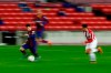 In this photo taken with slow shutter speed, Barcelona's Lionel Messi, left, runs with the ball during the Spanish La Liga soccer match between FC Barcelona and Athletic Bilbao at the Camp Nou stadium in Barcelona, Spain, Sunday, Jan. 31, 2021. (AP Photo/Joan Monfort)