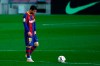 Barcelona's Lionel Messi gestures after Granada's Jorge Molina scored his side's second goal during the Spanish La Liga soccer match between FC Barcelona and Granada at the Camp Nou stadium in Barcelona, Spain, Thursday, April 29, 2021. (AP Photo/Joan Monfort)