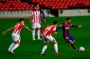 Barcelona's Lionel Messi, right, attempts a shot at goal in front of Athletic Bilbao's Dani Garcia, center, and Athletic Bilbao's Unai Vencedor during the Spanish La Liga soccer match between FC Barcelona and Athletic Bilbao at the Camp Nou stadium in Barcelona, Spain, Sunday, Jan. 31, 2021. (AP Photo/Joan Monfort)