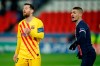 Barcelona's Lionel Messi reacts after a missed a penalty shot during the Champions League, round of 16, second leg soccer match between Paris Saint-Germain and FC Barcelona at the Parc des Princes stadium in Paris, Wednesday, March 10, 2021. (AP Photo/Christophe Ena)
