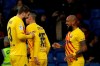 Barcelona's Arturo Vidal, right, celebrates with Barcelona's Gerard Pique after scoring his side's second goal during the Spanish La Liga soccer match between Espanyol and Barcelona at the RCDE Stadium in Barcelona, Spain, Saturday, Jan. 4, 2020. (AP Photo/Joan Monfort)