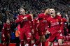 Liverpool players celebrate after Shrewsbury Town's Ro-Shaun Williams, scored an own goal during the English FA Cup Fourth Round replay soccer match between Liverpool and Shrewsbury Town at Anfield Stadium, Liverpool, England, Tuesday, Feb. 4, 2020. (AP Photo/Jon Super)
