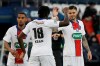 PSG's Mauro Icardi, right, celebrates with PSG's Moise Kean after scoring his side's fifth goal during the French Cup quarter final soccer match between Paris Saint-Germain and Angers SCO at the Parc des Princes stadium in Paris, France, Wednesday, April 21, 2021. (AP Photo/Lewis Joly)