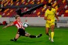 Fulham's Antonee Robinson, right, is challenged by Brentford's Finn Stevens during the EFL Cup 4th round soccer match between Brentford and Fulham at Brentford Community Stadium in London, England, Thursday, Oct. 1, 2020. (Andrew Couldridge/Pool via AP)