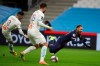PSG's Neymar, right, is fouled by Marseille's Alvaro, left, during the French League One soccer match between Olympique de Marseille and Paris Saint-Germain at the Velodrome stadium in Marseille, southern France, Sunday, Feb. 7, 2021. (AP Photo/Daniel Cole)