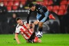 Aston Villa's Anwar El Ghazi, right, is fouled by Sheffield United's Phil Jagielka during the English Premier League soccer match between Sheffield United and Aston Villa at Bramall Lane stadium in Sheffield, England, Wednesday, March 3, 2021. (Clive Mason/Pool Photo via AP)