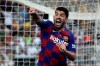Barcelona's Luis Suarez reacts during the Spanish Super Cup semifinal soccer match between Barcelona and Atletico Madrid at King Abdullah stadium in Jiddah, Saudi Arabia, Thursday, Jan. 9, 2020. (AP Photo/Hassan Ammar)