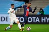 PSG's Neymar, right, is challenged by Marseille's Alvaro during the French League One soccer match between Olympique de Marseille and Paris Saint-Germain at the Velodrome stadium in Marseille, southern France, Sunday, Feb. 7, 2021. (AP Photo/Daniel Cole)