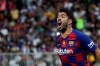 Barcelona's Luis Suarez reacts during the Spanish Super Cup semifinal soccer match between Barcelona and Atletico Madrid at King Abdullah stadium in Jiddah, Saudi Arabia, Thursday, Jan. 9, 2020. (AP Photo/Hassan Ammar)