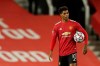 Manchester United's Marcus Rashford walks end of the Champions League group H soccer match between Manchester United and RB Leipzig, at the Old Trafford stadium in Manchester, England, Wednesday, Oct. 28, 2020. (AP Photo/Dave Thompson)