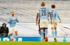 Manchester City's Sergio Aguero, left, celebrates after scoring his side's second goal during the Champions League, Group C, soccer match between Manchester City and Marseille at the Etihad stadium in Manchester in London Wednesday, Dec. 9, 2020. (AP Photo/Jon Super)