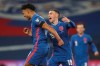 England's Ollie Watkins, left, celebrates after scoring his side's fifth goal with England's Phil Foden during the World Cup 2022 group I qualifying soccer match between England and San Marino at Wembley stadium in London, Thursday March 25, 2021. (Carl Recine/Pool Photo via AP)