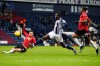 West Bromwich Albion's Mbaye Diagne, center, misses a scoring chance in front Manchester United's Victor Lindelof, left, and Manchester United's Aaron Wan-Bissaka during the English Premier League soccer match between West Bromwich Albion and Manchester United at the Hawthorns stadium in West Bromwich, England, Sunday, Feb. 14, 2021. (Michael Steele/Pool Photo via AP)