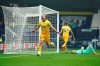 Tottenham's Harry Kane, left, celebrates after scoring his side's opening goal during the English Premier League soccer match between West Bromwich Albion and Tottenham Hotspur at the Hawthorns in West Bromwich, England, Sunday, Nov. 8, 2020. (AP Photo/Dave Thompson, Pool)
