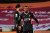 Liverpool's Georginio Wijnaldum gestures after Aston Villa's Jack Grealish scores his side's sixth goal during the English Premier League soccer match between Aston Villa and Liverpool at the Villa Park stadium in Birmingham, England, Sunday, Oct. 4, 2020. (AP Photo/Rui Vieira, Pool)