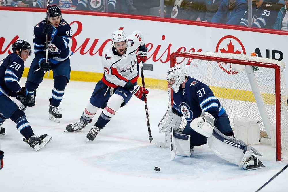 THE CANADIAN PRESS/John Woods
Winnipeg Jets' Connor Hellebuyck stops the wrap-around attempt by Washington Capitals' Tom Wilson during the third period in Winnipeg on Thursday. Hellebuyck could be considered the team's best penalty killer.