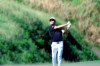 Joaquin Niemann hits onto the ninth green during the final round of the Tournament of Champions golf event, Sunday, Jan. 10, 2021, at Kapalua Plantation Course in Kapalua, Hawaii. (Matthew Thayer/The Maui News via AP)